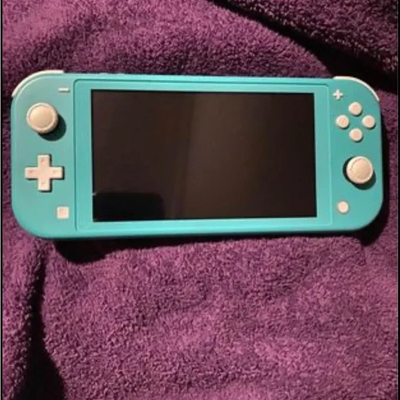 Nintendo Switch lite ( teal )